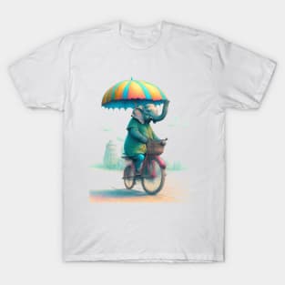 An elephant on a bicycle, holding an umbrella. T-Shirt